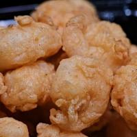 Popcorn Shrimp · Perfect little bite-size,crispy and flavorful shrimp. 
Served with boom boom sauce.