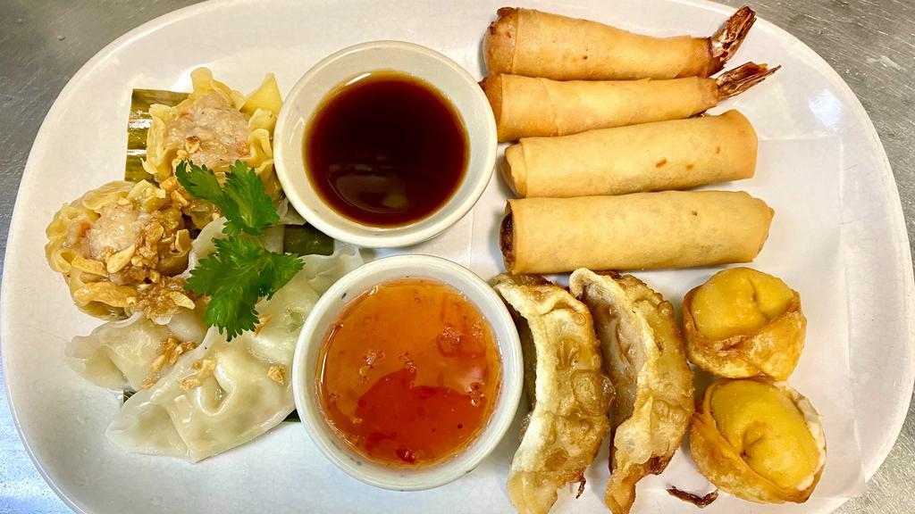 Mixed Appetizers · Chicken Gyoza, Crab Rangoon, Vegetable Dumpling, Steamed Pork Shumai , shrimp roll and spring roll.
