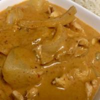 Massaman Curry  · Coconut milk, onion, peanut and potato. Spicy.