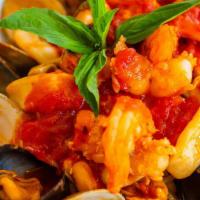 Seafood Lover'S Platter · Sauteed clams, shrimps, mussels, calamari and scungilli in a robust marinara or Fra Diavolo ...