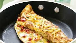 Mexican Omelet · Eggs and cheese with peppers, onion, jalapeño, hot sauce.