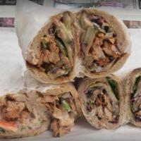 Super Veggie Wrap · A warm wrap stuffed with fresh cracked eggs, mushrooms, spinach, peppers, and onion.