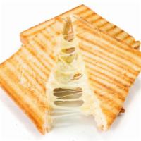 Grilled Cheese Stuffed With French Fries · Crispy golden french fries and Creamy cheese melted between buttery toasted bread.