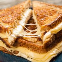 Buffalo Grilled Cheese · Tangy buffalo sauce and Creamy cheese melted between buttery toasted bread.