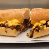 Philly Cheese Steak · Juicy thinly sliced beef steak smothered in a creamy cheese and served between a buttery toa...