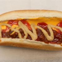 Chili Cheese Dog · A juicy hot dog topped with hearty chili and creamy cheese served in toasted buns.