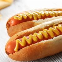Cheese Dog · A juicy hot dog topped with creamy cheese served in toasted buns.