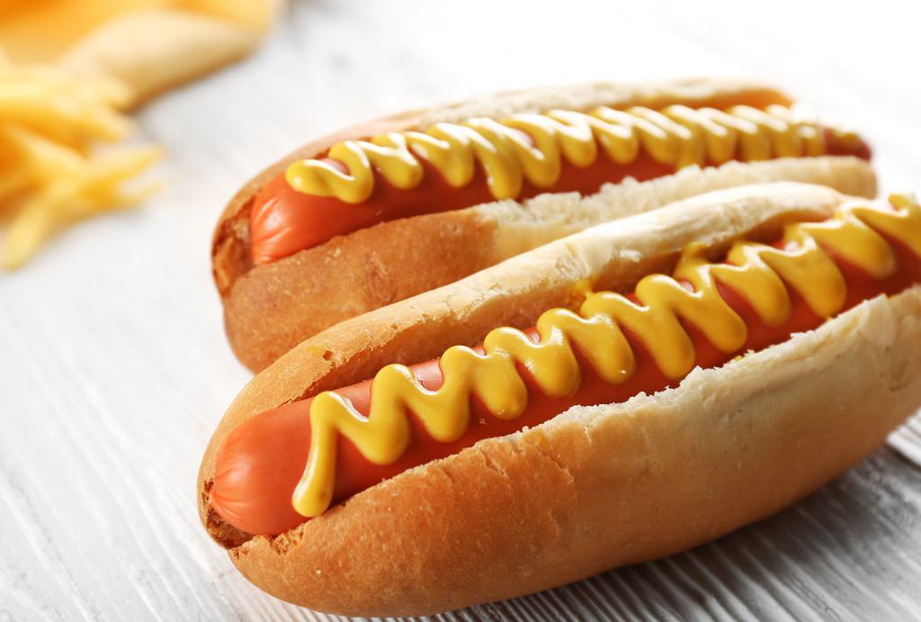 Cheese Dog · A juicy hot dog topped with creamy cheese served in toasted buns.