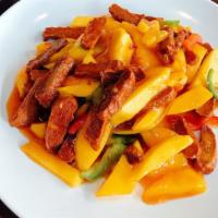 Mango Soy Protein · Spicy. Fresh mango with vegetarian chicken, sautéed with onions and red bell peppers in a ci...