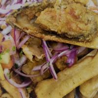 Jalea · Traditional Peruvian batter-coated calamari, mussels, fish chunks, shrimps, and crab fried t...