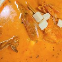 Chupe De Mariscos · A rich milky seafood soup brewed to perfection and accompanied by Calamari, shrimps, squids,...