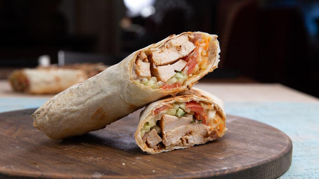 Chicken Parmesan Wrap · Delicious Wrap made with Chicken cutlets, tomato sauce and mozzarella cheese.