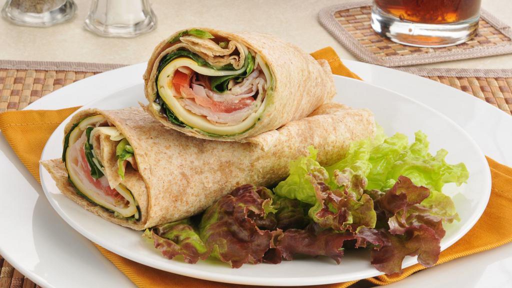 Turkey Club Wrap · Oven gold turkey with bacon, lettuce, tomatoes and mayo.