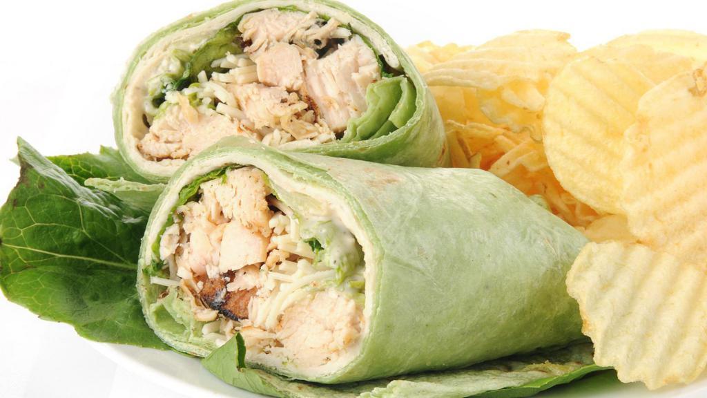 Chicken Caesar Wrap · Grilled chicken with croutons, Parmesan cheese, romaine lettuce and Caesar dressing.