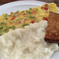 Western Omelette · Eggs, green peppers, red peppers, scallions, and cheese. Served with toast and home fries or...