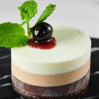 Chocolate Mousse · A three-tier decadent dessert - yum!