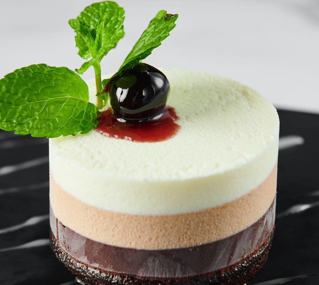 Chocolate Mousse · A three-tier decadent dessert - yum!