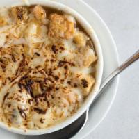 French Onion Soup · Served with homemade croutons and melted cheese