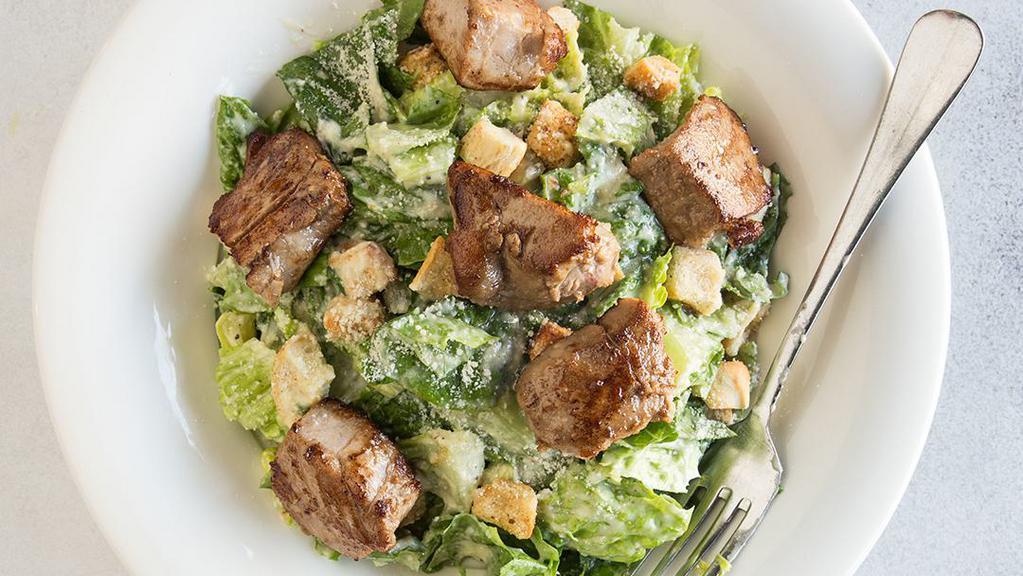 Grilled Tuna Caesar Salad · A Caesar salad with chunks of grilled tuna.