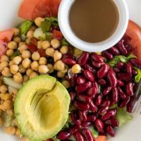 Central Perk Salad · Tomatoes, cucumber, peppers, chickpeas, kidney beans, avocado, and hearts of romaine served ...