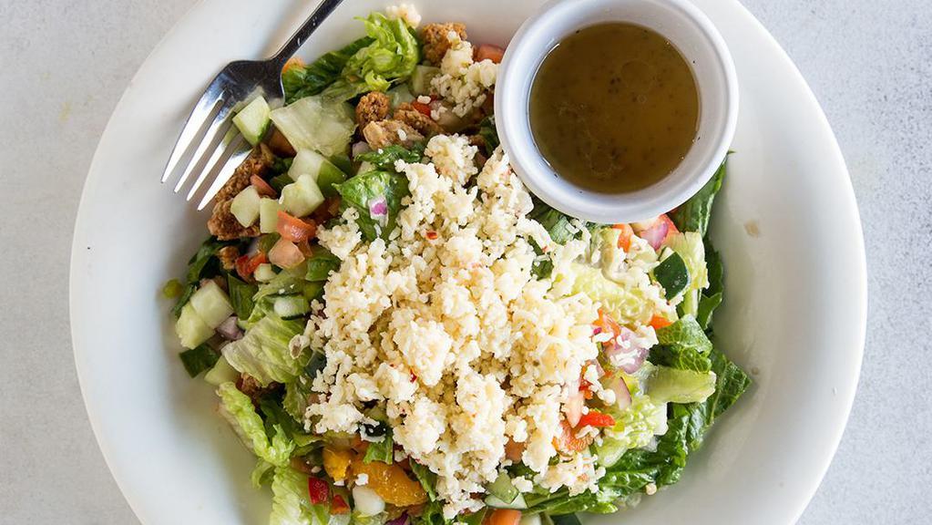 Pepper Jack Salad · Diced tomatoes, cucumber, red onion, granola, peppers, baby carrots, mandarin orange, and hearts of romaine served with a red wine vinaigrette.