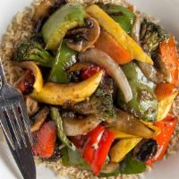 Vegetable Stir Fry · Mushrooms, peppers, zucchini, squash, onions, snow peas, broccoli, and carrots. Served over ...