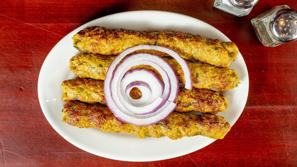 Chicken Double Seekh Kabab Roll · Two chicken Seekh Kabab wrapped in home made Naan bread