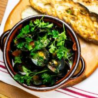 Sautéed Mussels	 · COZZE MARINATE	
Sautéed Mussels, Garlic, Tocai White Wine