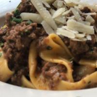 Tagliattelle With Bolognese	 · TAGLIATTELLE BOLOGNESE	
Traditional Bolognese Sauce