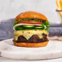 Jalapeno Business Burger  · American beef patty topped with melted cheddar cheese, jalapenos, lettuce, tomato, onion, an...