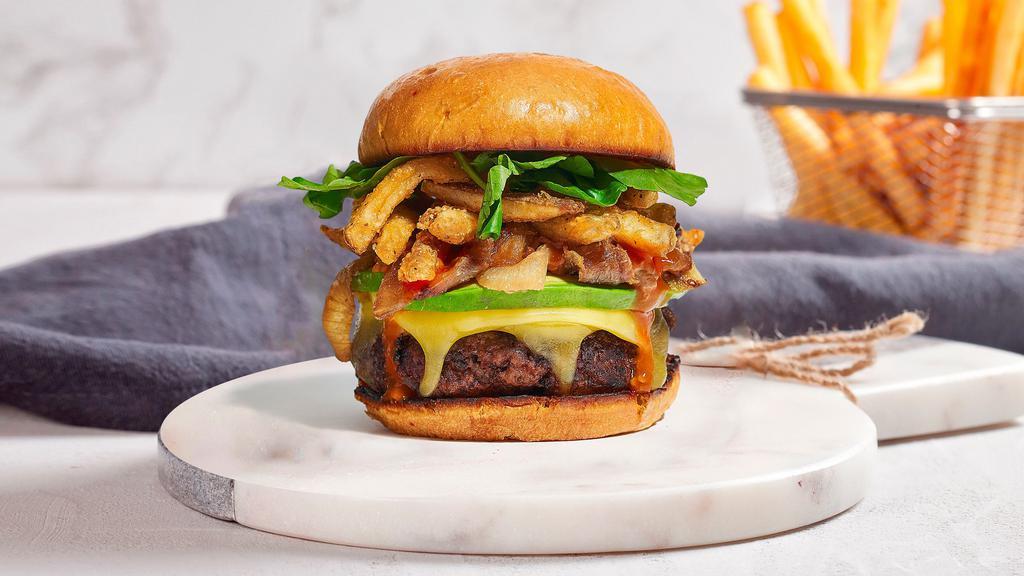 Time Fries By Burger  · American beef patty topped with fries, melted cheddar cheese, avocado, caramelized onions, lettuce, tomato, onion, and pickles. Served on your choice of bun.