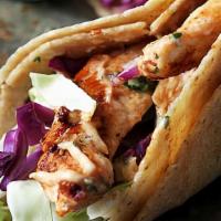 Jerk Chicken Tacos · corn tortillas, onions, tomatoes, vegan cilantro lime spicy mayo