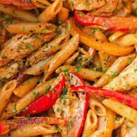 Shrimp Rasta Pasta · Creamy penne pasta with sautéed onions, peppers, carrots, garlic, ginger, cilantro, penne pa...
