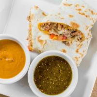 Chorizo Amigo Burrito · Spiced and seasoned ground pork topped with sour cream, salsa, cheese, and spanish rice wrap...