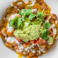 Carne Asada Opera House Bowl · Grilled sirloin steak topped with sour cream, salsa, cheese, and spanish rice served in a bo...