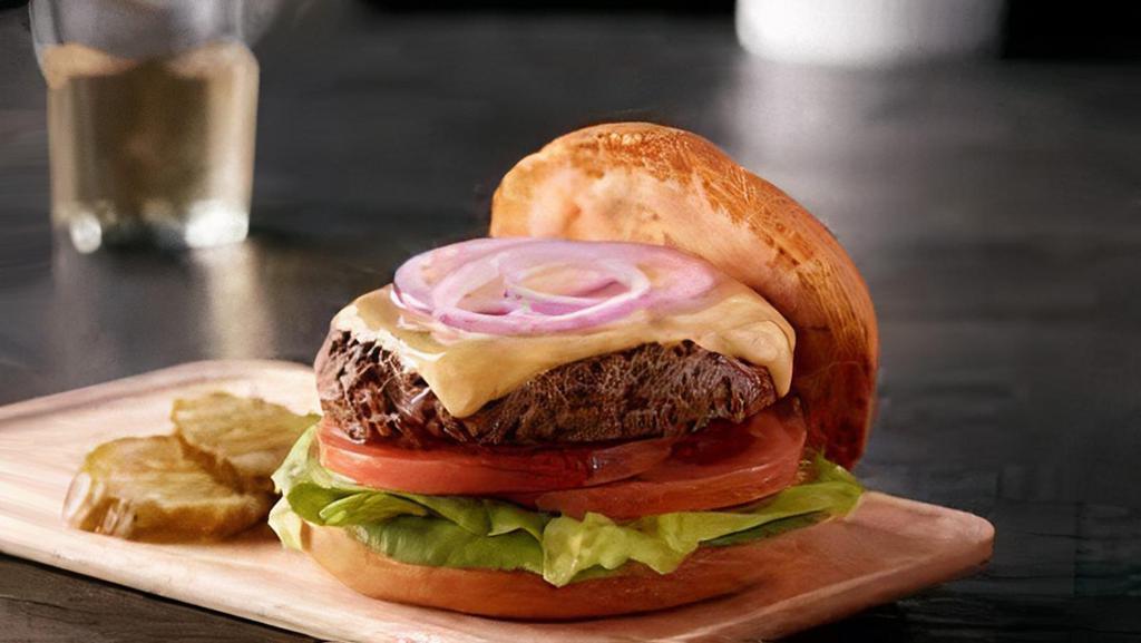 Cheeseburger Deluxe · Served with a choice of American, Swiss, cheddar, blue cheese, and mozzarella cheese.