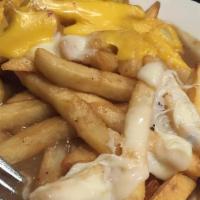 Disco Fries · Served with gravy and melted cheese.