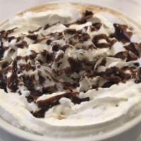Almond Joy Latte · Steamed milk blended with espresso, coconut and chocolate sauce, topped with whipped cream a...