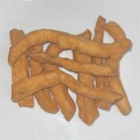 Namak Paray · Savory strips of pastry seasoned with salt, cumin seeds and fried in oil. Per pack.