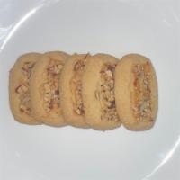 Almond Cookies · A shop favorite, traditional cookie with almonds on top. (sliced and baked almonds).