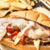 Chicken Cheesesteak Combo · Served with French fries and a can of soda.