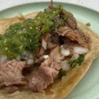 Carnitas Taco · Slowly braised pork carnitas