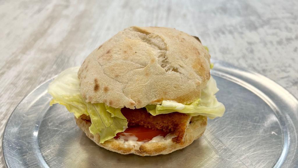 Panino Con Pollo · Fried Chicken, Tomatoes, Lettuce and Mayonnaise on our Homemade Panino Bread