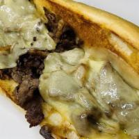 French Onion Chezstk · Our ribeye shaved steak with caramelized onions topped with swiss and provolone cheese.