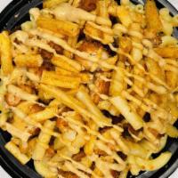 Loaded Mac · Elbow macaroni in our homemade cheese sauce, with spicy chicken fingers, spicy french fries,...