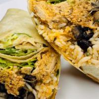 Puebla Burrito · Cilantro lime rice, beans, lettuce, avocado crema, and sour cream. Served with your choice o...