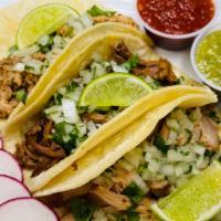 Mexican Taco · Cilantro & onion mix, salsa verde, sliced radish and lime. Served on 3 corn tortillas.