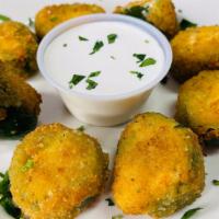 Jalapeno Poppers · 8 pieces of our homemade jalapeño poppers made with real cream cheese and served with a side...
