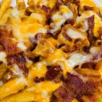Loaded Fries · Fries topped with bacon, cheese wiz, and ranch.