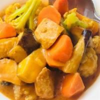 Curry Chicken · Spicy. Carrot, Potato, Cauliflower, Eggplant.
Served with white rice or brown rice.